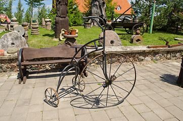 Image showing Retro vintage rusty steel bicycle imitation park 