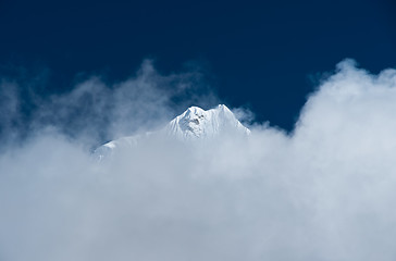 Image showing Mountain peak hidden in clouds in Himalayas