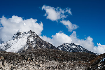 Image showing Summit and clouds near Sacred Lake of Gokyo in Himalayas
