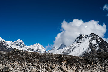 Image showing Peaks and clouds near Sacred Lake of Gokyo in Himalayas