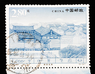 Image showing CHINA - CIRCA 2002: A Stamp printed in China shows the famous Naxi dwellings in Lijiang Yunnan, circa 2002