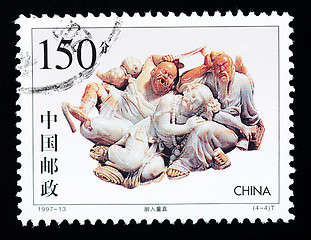 Image showing CHINA - CIRCA 1997: A Stamp printed in China shows the stone carving art of getting drunk into the innocence  , circa 1997