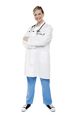 Image showing Female physician standing with crossed arms