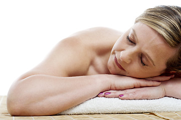 Image showing Cropped image of woman relaxing at spa centre