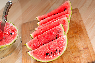 Image showing fresh watermelon on a  wood table