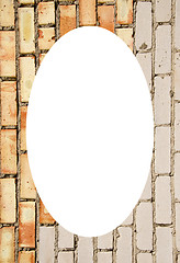 Image showing Red and white brick wall and white oval in center 