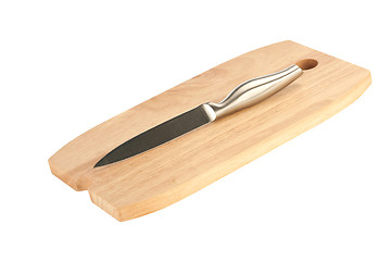 Image showing table knife and wooden cutting board