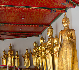 Image showing Row of buddha statues in Wat Po temple