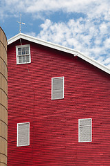 Image showing Traditional US red painted barn on farm