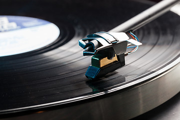 Image showing Vinyl analog record player cartridge and LP