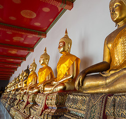 Image showing Row of buddha statues in Wat Po temple