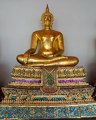 Image showing Single ornate buddha statue in Wat Po temple