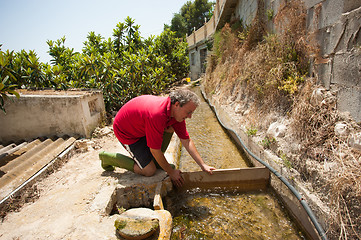 Image showing Irrigating