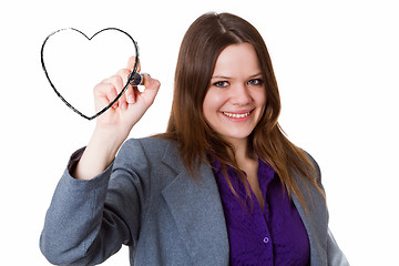 Image showing Businesswoman drawing a heart