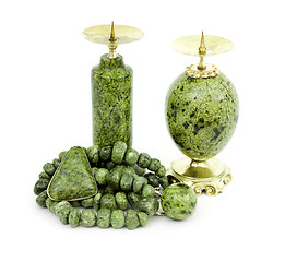 Image showing Candle holders, necklaces and a brooch made of stone serpentine