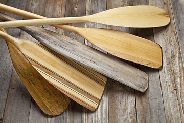Image showing wooden canoe paddles