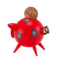 Image showing Red piggybank with pfennig isolated on white 