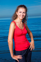 Image showing Cute sport girl at the beach