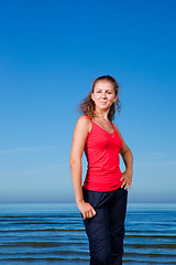 Image showing Cute sport girl at the beach