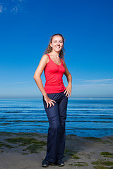 Image showing Cute sport girl at the beach