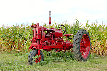 Image showing Antique Red Tractor and Corn