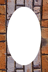 Image showing Background of red brick wall white oval in center 