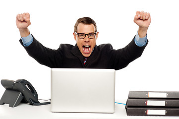 Image showing Excited businessman shouting and rejoicing