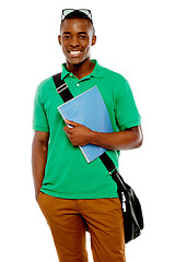 Image showing College student with sunglasses over his head