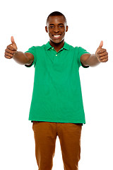 Image showing Handsome african showing double thumbs up