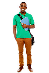 Image showing Student carrying laptop bag and notebook