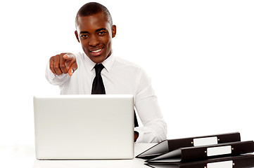 Image showing Confident businessman pointing at you