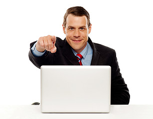 Image showing Handsome male executive pointing at you