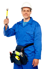 Image showing Male architect team guy holding hammer