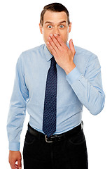 Image showing Surprised businessman with hand on mouth