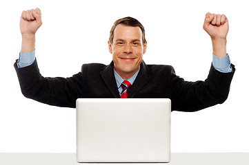 Image showing Excited businessman celebrating success