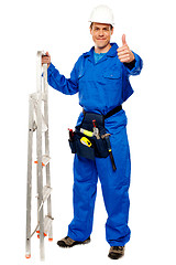 Image showing Repairman holding ladder and showing thumbs up