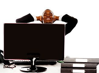 Image showing Young african businessman relaxing