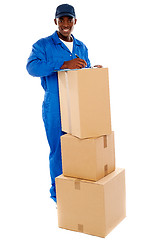 Image showing Cheerful delivery guy preparing receiving notice