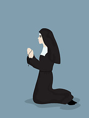 Image showing Praying nun