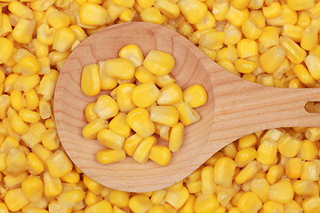 Image showing Corn on a wooden spoon