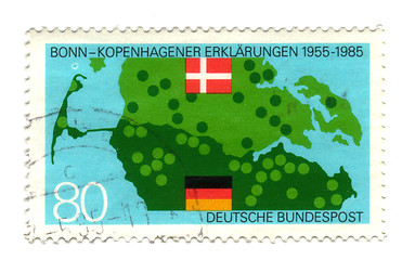 Image showing GERMANY - CIRCA 1989: A stamp printed in Germany shows map and f