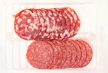 Image showing Slices Salami in container