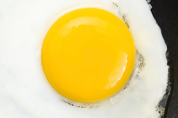 Image showing Fried eggs on on a pan