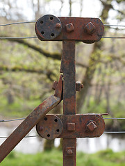 Image showing Rusty steel wire fence and tensioner, Scotland.