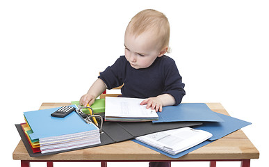 Image showing young child at writing desk