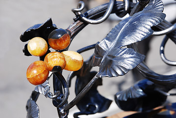 Image showing artistic forging with stone grape berries