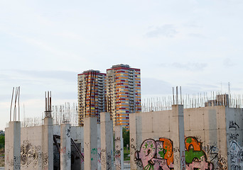 Image showing Unfinished building painted graffiti skyscrapers 