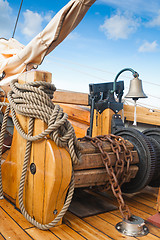 Image showing ship's Bell and anchor lifting mechanism on an old sailboat