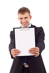 Image showing man holding a blank clipboard