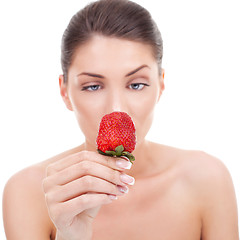 Image showing woman holding strawberry